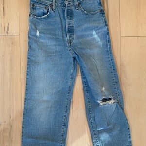 Women’s classic Levi’s blue Distressed Jeans, in great condition. Size US 26.